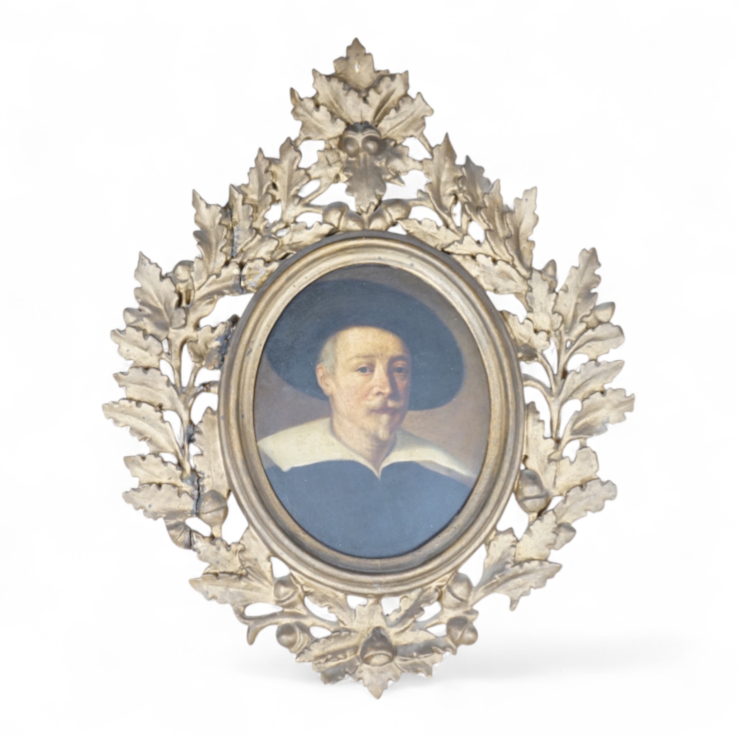 After Guido Reni, copy of his self-portrait, inscribed in ink verso, oval oil on board, 20 x 60cm, housed in Florentine frame